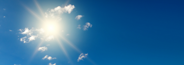 Blog of Best Time to Take Vitamin B12 for Maximum Benefits which have image A clear blue sky with the sun shining brightly, casting radiant beams of light. 