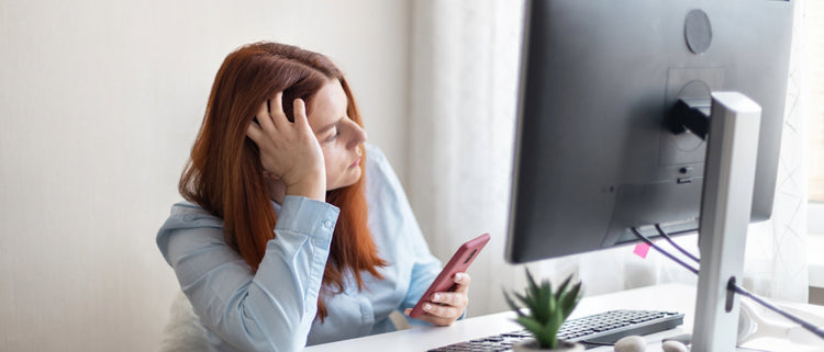 Blog of How to Navigate Election Anxiety & Support Your Mental Health Through Election Season which have image woman dejected at computer