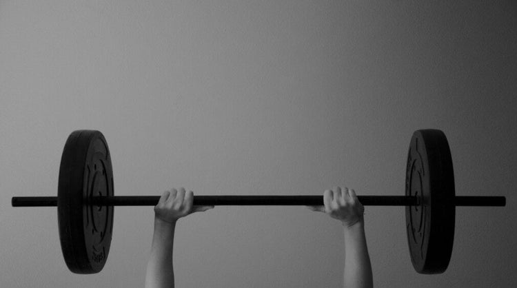 Blog of Improve Mitochondrial Function & Health: Supplements, Diet, & Habits which have image Man lifting weights