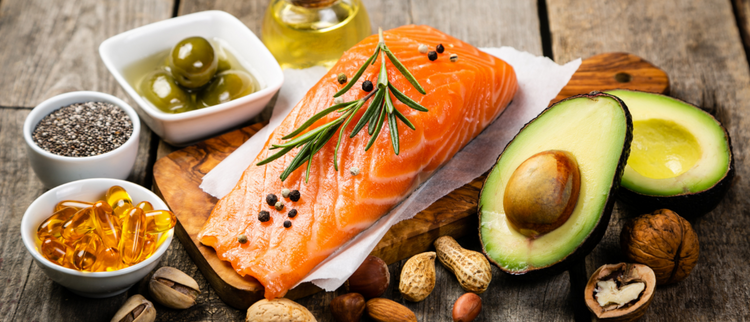 Blog of When to Take Fish Oil for Maximum Benefits which have image The rustic wooden background highlights the richness of these omega-3 sources.